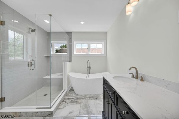 Bathroom, Dual Sink Vanities, Free Standing Baths, Glass Shower, Interior, Marble, Recessed Lighting