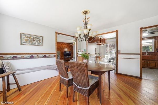 Chandelier, Dining room, Fireplace, Interior, Living room, Wood Texture Flooring