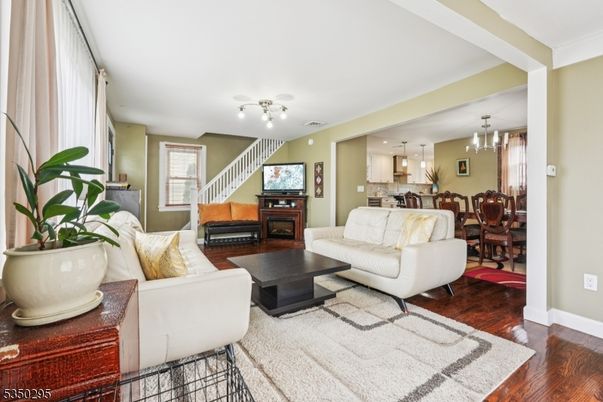 Chandelier, Dining room, Interior, Kitchen, Living room, Pendant Lights, Recessed Lighting, Wood Texture Flooring