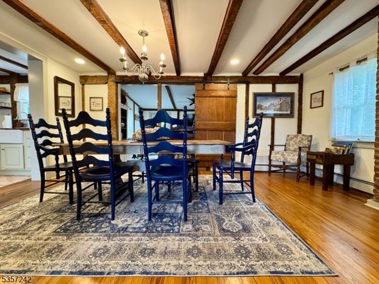 Chandelier, Dining room, Interior, Recessed Lighting, Wooden Beams, Wood Texture Flooring