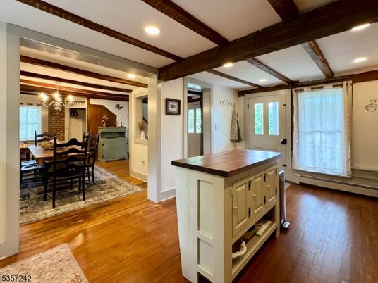 Chandelier, Dining room, Interior, Recessed Lighting, Wooden Beams, Wood Texture Flooring