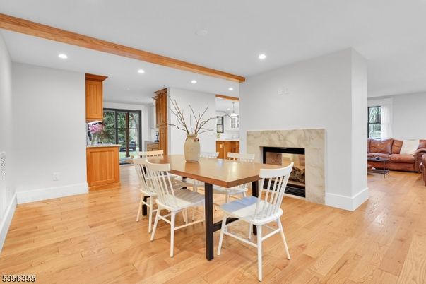 Dining room, Fireplace, Interior, Living room, Recessed Lighting, Wooden Beams, Wood Texture Flooring