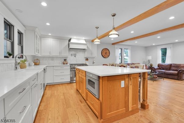 Interior, Kitchen, Living room, Pendant Lights, Recessed Lighting, Stainless Steel Appliances, Wooden Beams, Wood Texture Flooring