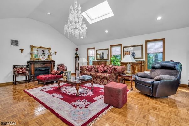 Chandelier, Fireplace, Interior, Living room, Recessed Lighting, Wood Texture Flooring
