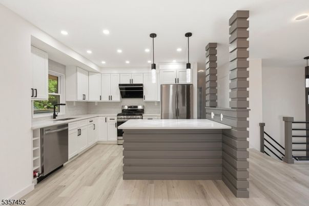 Interior, Kitchen, Pendant Lights, Recessed Lighting, Stainless Steel Appliances, Wood Texture Flooring
