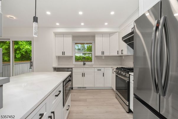 Interior, Kitchen, Pendant Lights, Recessed Lighting, Stainless Steel Appliances, Wood Texture Flooring