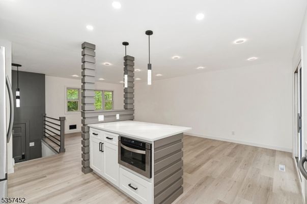 Interior, Kitchen, Pendant Lights, Recessed Lighting, Stainless Steel Appliances, Wood Texture Flooring