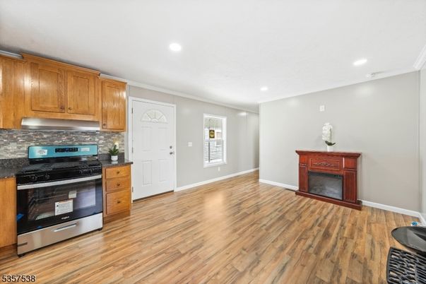 Fireplace, Interior, Kitchen, Recessed Lighting, Wood Texture Flooring