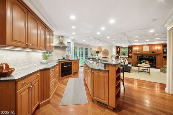 Fireplace, Interior, Kitchen, Living room, Recessed Lighting, Wood Texture Flooring