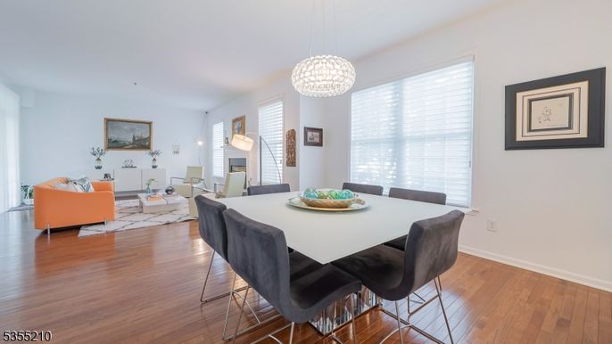 Dining room, Fireplace, Interior, Living room, Pendant Lights, Wood Texture Flooring