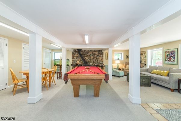 Billiard Table, Dining room, Fireplace, Game Room, Interior, Living room, Stone Walls