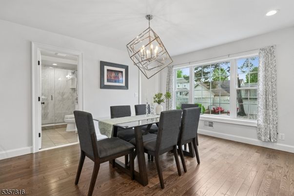 Dining room, Interior, Marble Walls, Pendant Lights, Recessed Lighting, Wood Texture Flooring