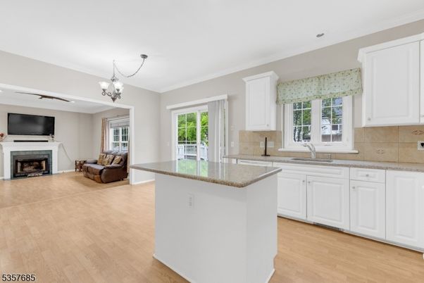 Chandelier, Fireplace, Interior, Kitchen, Living room, Wood Texture Flooring