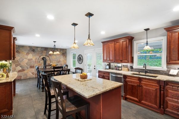 Dining room, Interior, Kitchen, Pendant Lights, Recessed Lighting, Stainless Steel Appliances, Stone Walls