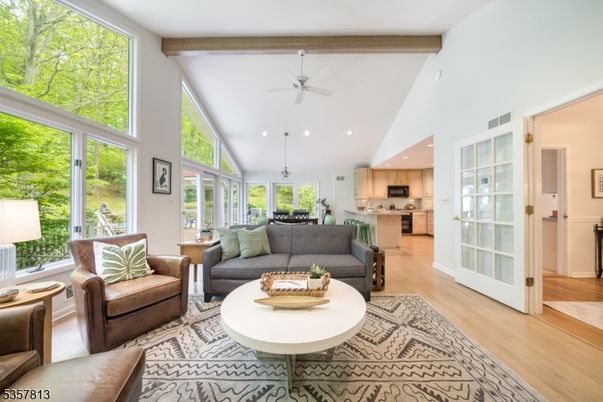 Dining room, Interior, Kitchen, Living room, Pendant Lights, Recessed Lighting, Stainless Steel Appliances, Wooden Beams, Wood Texture Flooring
