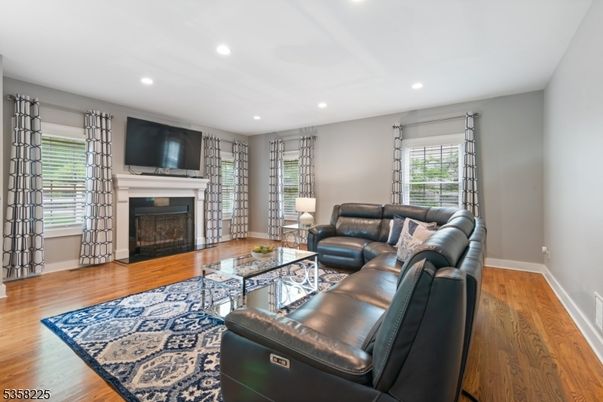 Fireplace, Interior, Living room, Recessed Lighting, Wood Texture Flooring
