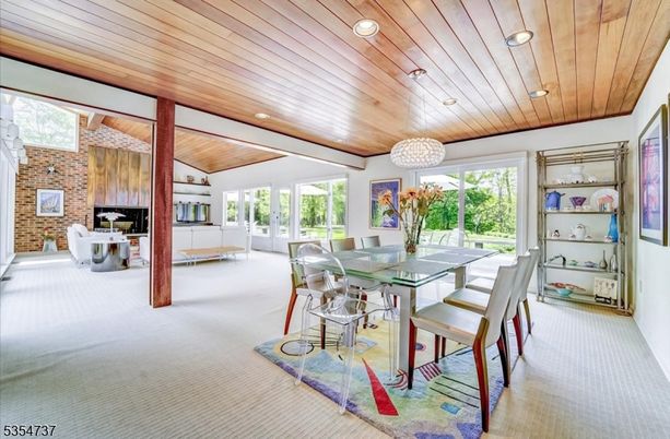 Dining room, Fireplace, Interior, Recessed Lighting, Stone Walls, Wooden Ceilings