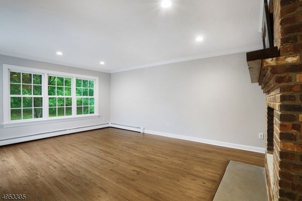 Empty room, Fireplace, Interior, Recessed Lighting, Wood Texture Flooring