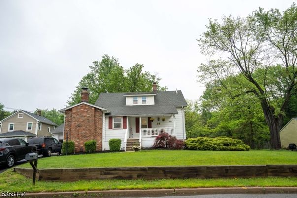 Exterior, Facade, Brick Facade, Cape Cod
