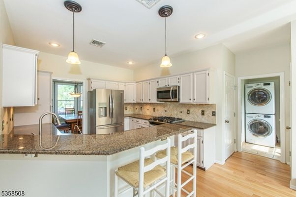 Interior, Kitchen, Pendant Lights, Recessed Lighting, Stainless Steel Appliances, Washer, Wood Texture Flooring
