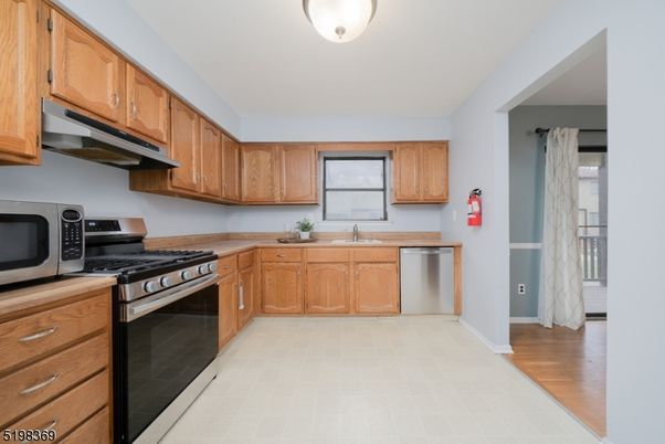 Interior, Kitchen, Stainless Steel Appliances, Wood Texture Flooring