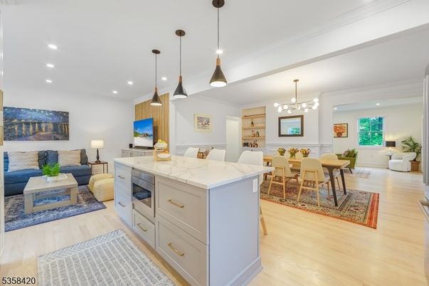 Chandelier, Dining room, Interior, Kitchen, Living room, Pendant Lights, Recessed Lighting, Wood Texture Flooring