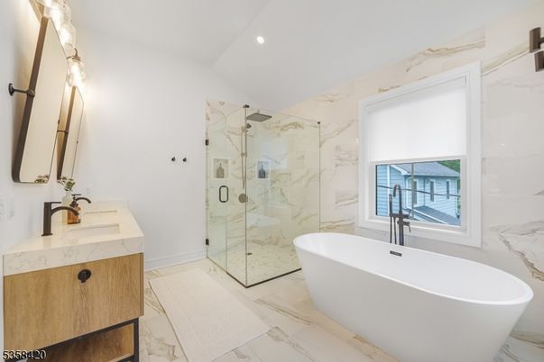 Bathroom, Free Standing Baths, Glass Shower, Interior, Marble, Marble Walls, Recessed Lighting