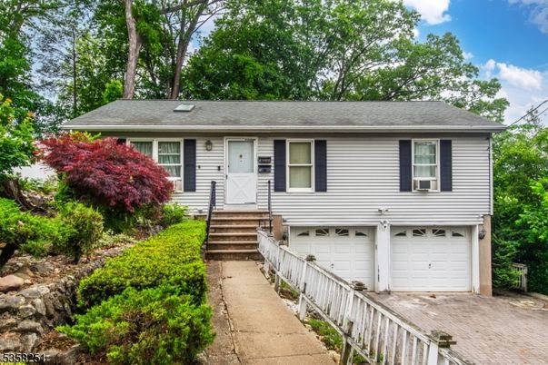 Attached, Exterior, Facade, Raised Ranch