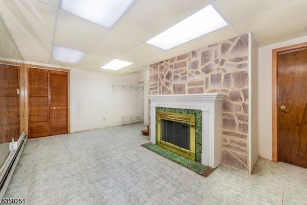 Fireplace, Interior, Recessed Lighting, Stone Walls
