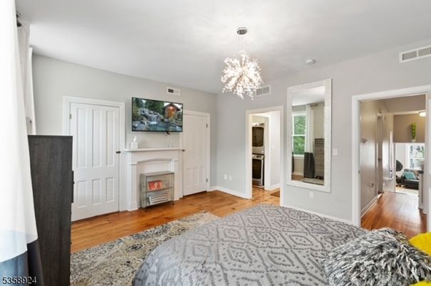Chandelier, Fireplace, Interior, Wood Texture Flooring