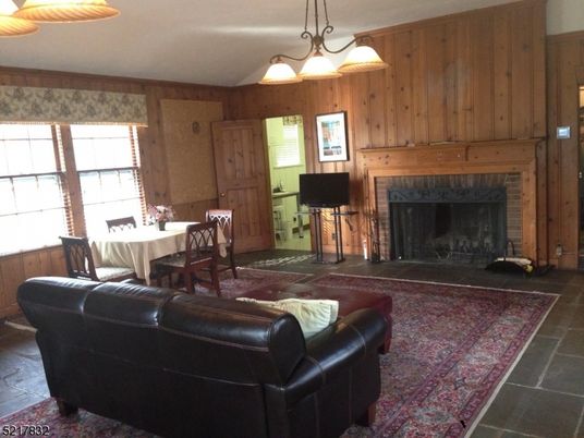 Chandelier, Dining room, Fireplace, Interior, Living room, Wooden Walls