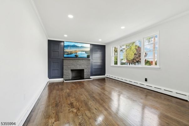 Empty room, Fireplace, Interior, Recessed Lighting, Wood Texture Flooring