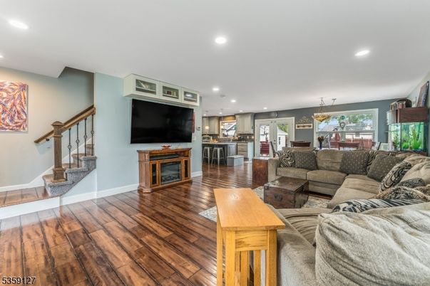 Chandelier, Dining room, Interior, Kitchen, Living room, Pendant Lights, Recessed Lighting, Wood Texture Flooring