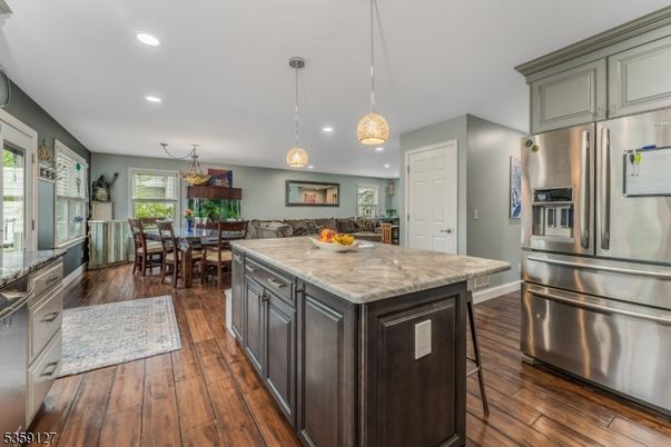 Dining room, Interior, Kitchen, Pendant Lights, Recessed Lighting, Stainless Steel Appliances, Wood Texture Flooring