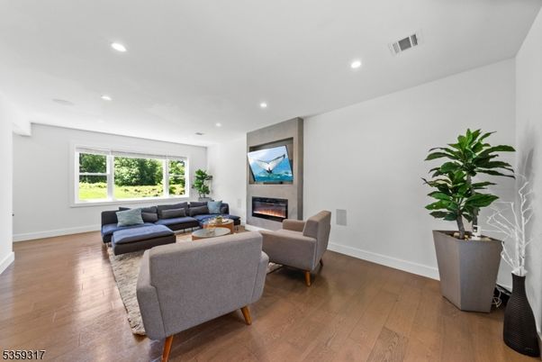 Fireplace, Interior, Living room, Recessed Lighting, Wood Texture Flooring