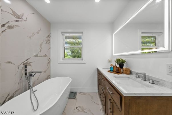 Bathroom, Dual Sink Vanities, Free Standing Baths, Interior, Marble, Marble Walls, Recessed Lighting