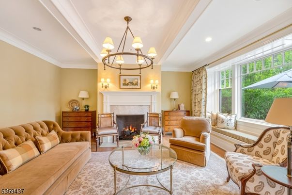 Chandelier, Fireplace, Interior, Living room, Recessed Lighting, Wood Texture Flooring