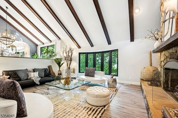 Chandelier, Fireplace, Interior, Living room, Recessed Lighting, Wooden Beams, Wood Texture Flooring