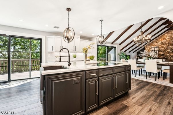 Chandelier, Dining room, Interior, Kitchen, Pendant Lights, Recessed Lighting, Wooden Beams, Wood Texture Flooring