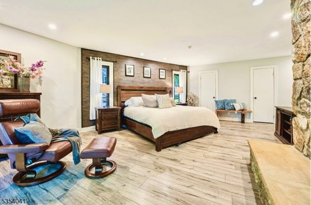 Bedroom, Fireplace, Interior, Recessed Lighting, Wood Texture Flooring