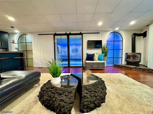 Fireplace, Interior, Pendant Lights, Recessed Lighting, Wood Texture Flooring
