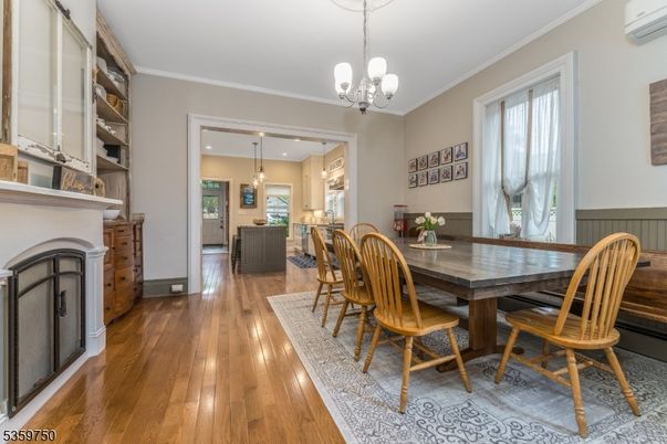 Dining room, Fireplace, Interior, Pendant Lights, Recessed Lighting, Wood Texture Flooring