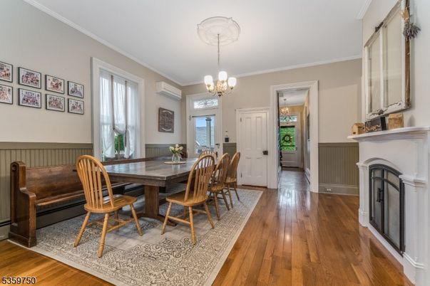 Dining room, Fireplace, Interior, Pendant Lights, Wood Texture Flooring