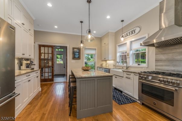 Interior, Kitchen, Pendant Lights, Recessed Lighting, Stainless Steel Appliances, Wood Texture Flooring