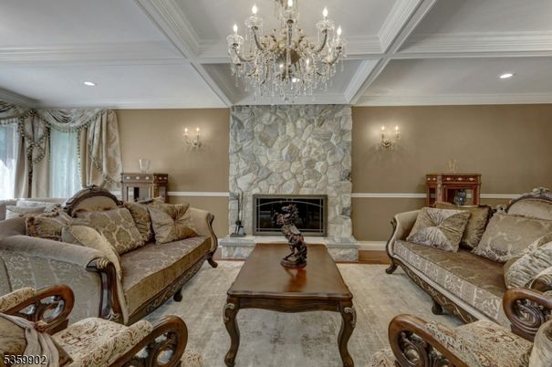 Chandelier, Fireplace, Interior, Living room, Recessed Lighting, Stone Walls