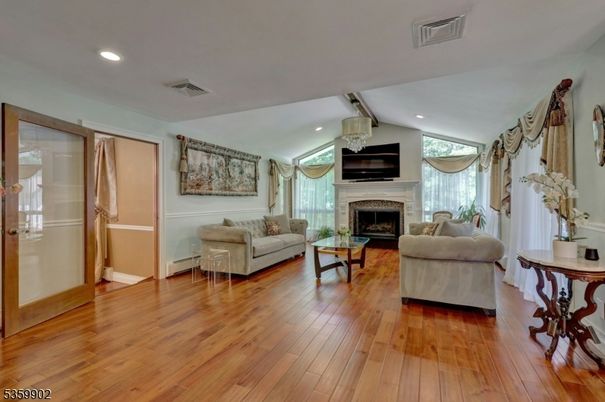 Fireplace, Interior, Living room, Recessed Lighting, Wood Texture Flooring