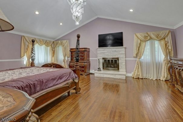Bedroom, Fireplace, Interior, Recessed Lighting, Wood Texture Flooring