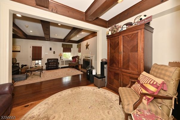 Fireplace, Interior, Living room, Recessed Lighting, Wooden Beams, Wood Texture Flooring