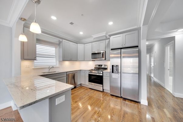 Interior, Kitchen, Pendant Lights, Recessed Lighting, Stainless Steel Appliances, Wood Texture Flooring