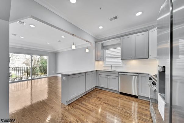 Interior, Kitchen, Pendant Lights, Recessed Lighting, Stainless Steel Appliances, Wood Texture Flooring